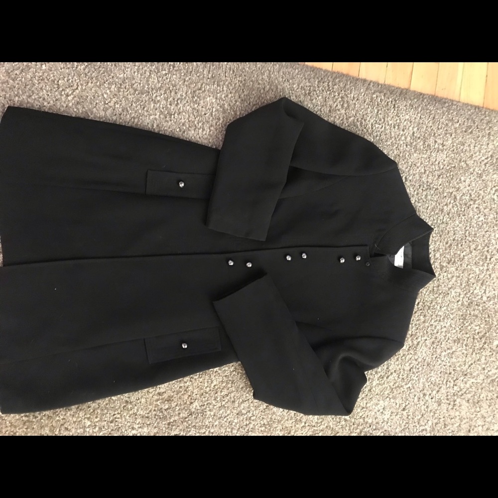Two piece woman’s suit.
